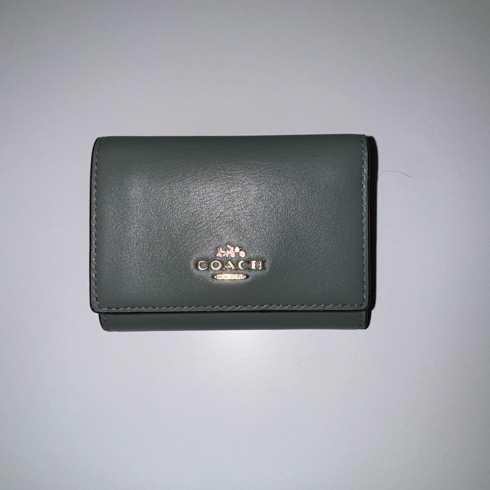 Small green coach wallet